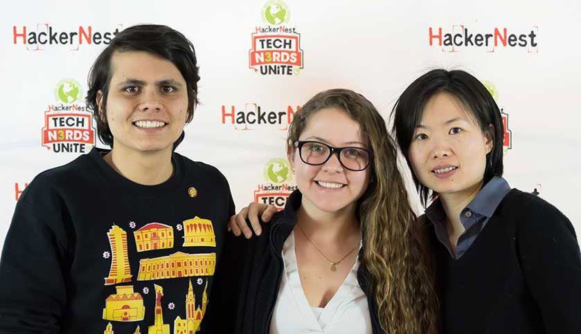  Seneca students Andres Velandia Rangel, Brigitte Martinez Trillo pose with Yanting Zhou at the Toronto Fishackathon