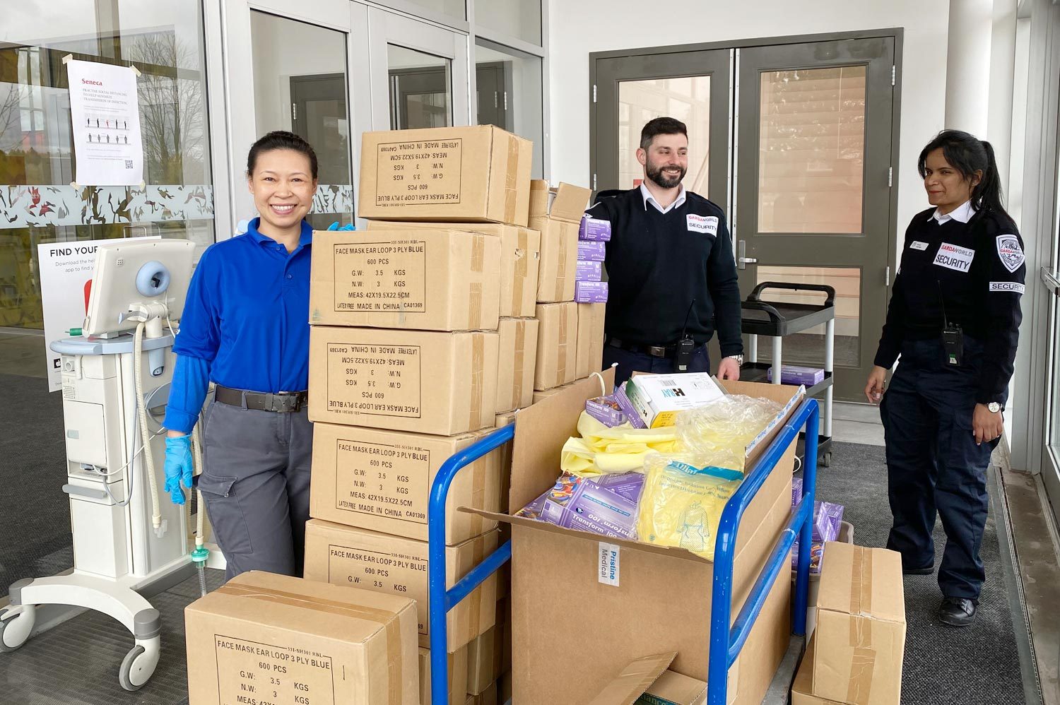 Sophie Huang, Ilya Slobodkin and Sonali Sonali at King Campus are helping moving boxes 
